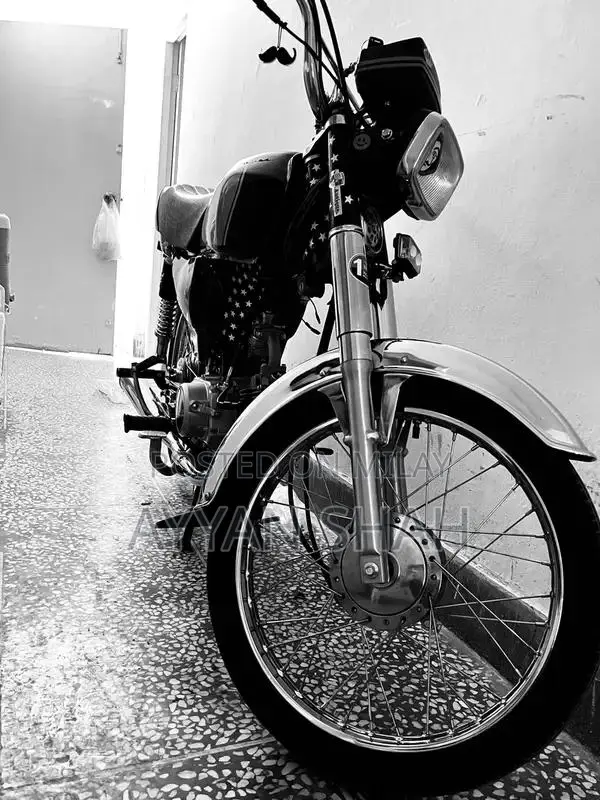 United 70cc Motorcycle: Low Mileage, Well-Maintained Bike