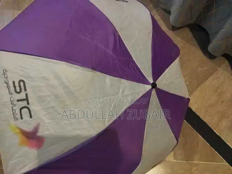 Compact Portable Umbrella - Lightweight and Barely Used