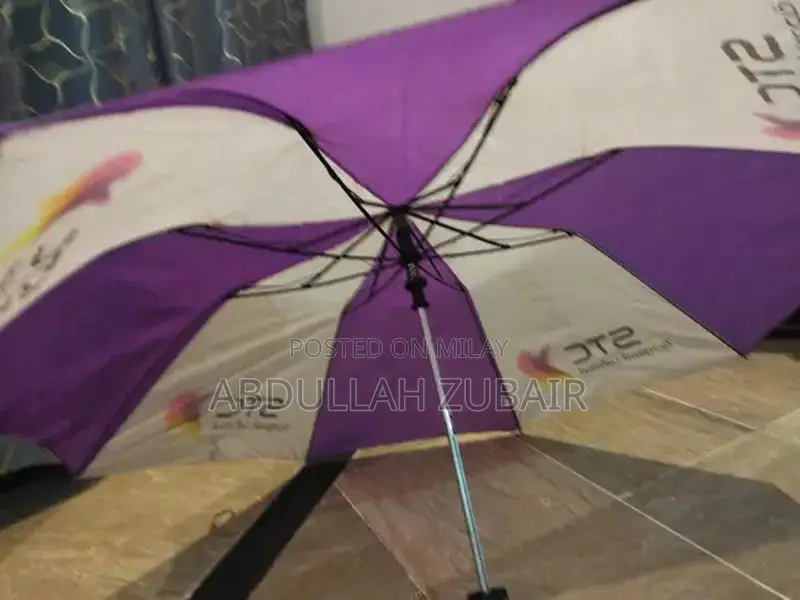 Compact Portable Umbrella - Lightweight and Barely Used