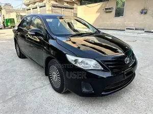 Photo - Toyota Corolla Gli 2012 Sedan - Well-Maintained Compact Car