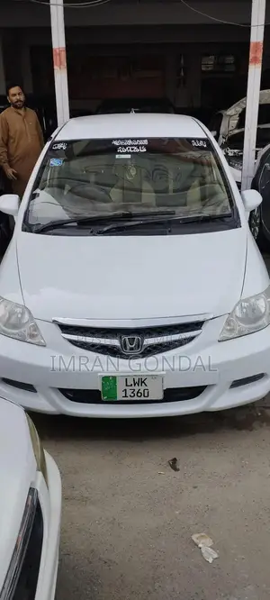 Photo - Honda City Sedan Reliable Compact Car with Alloy Rims