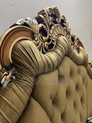 Luxury King Size Bed with Carved Wooden Headboard and Side Tables