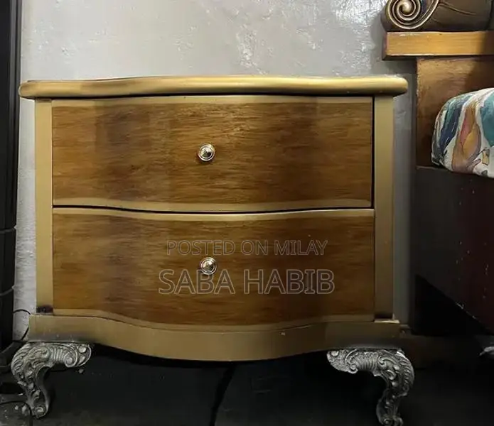 Luxury King Size Bed with Carved Wooden Headboard and Side Tables