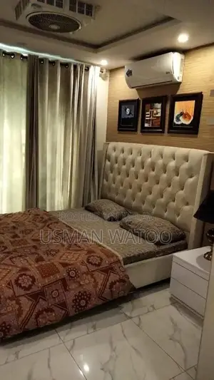 Photo - Furnished 1-Bedroom Flat with Modern Amenities