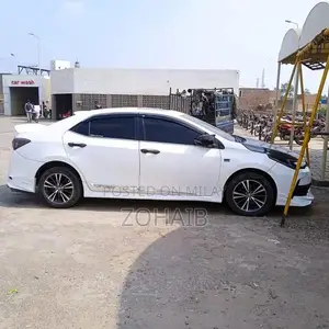 Photo - Toyota Corolla Altis Grande Sedan - Imported Luxury Compact Car