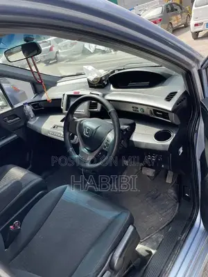 Honda Spike 5-Seater Compact SUV with Keyless Entry