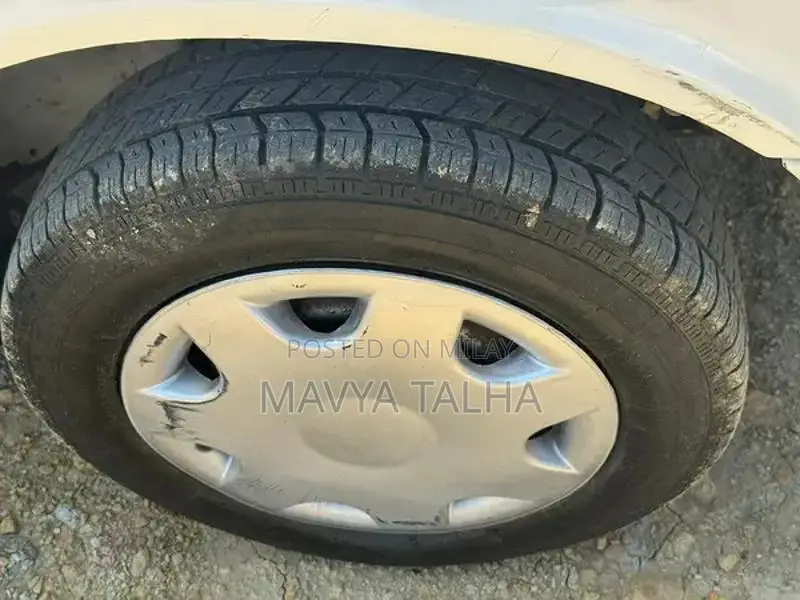 Suzuki Mehran VXR 1994 White Sedan - Classic Family Car