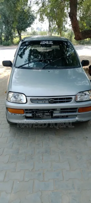 Photo - Daihatsu Cuore 1.0 2011 Silver