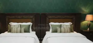 2 Single Beds with Molty Foam Mattresses and Side Table