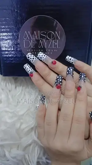 Photo - Black & White French Tip Press-On Nails with Ladybug Design