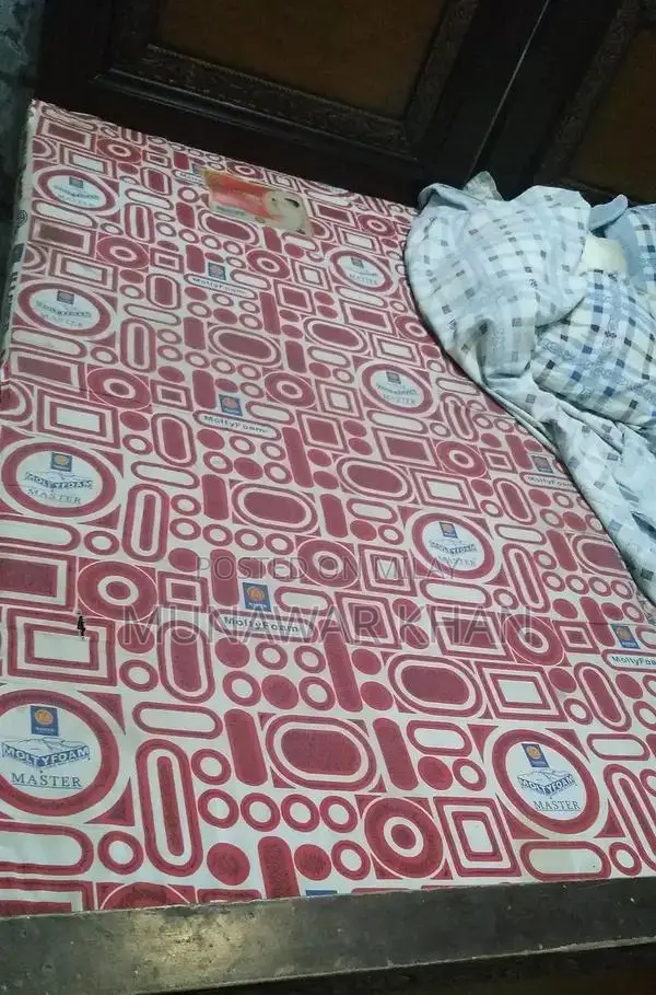 2 Single Beds with Molty Foam Mattresses and Side Table