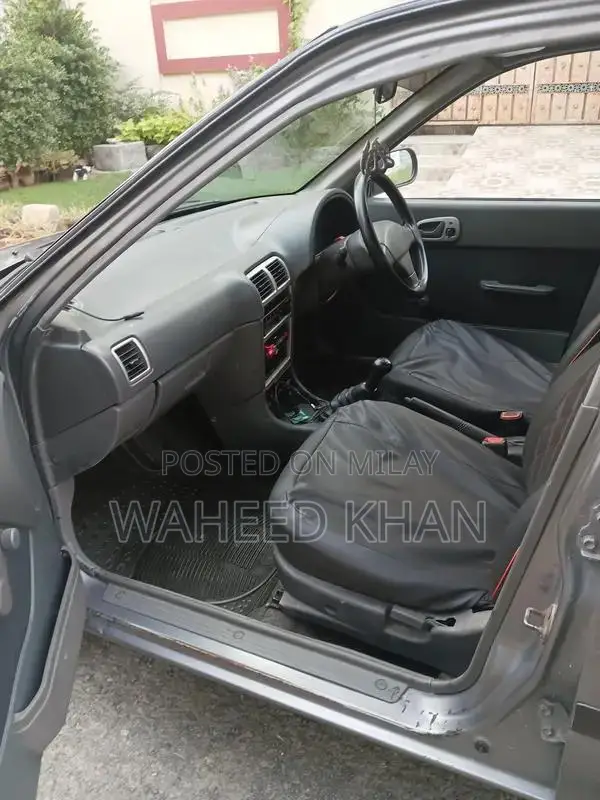 Suzuki Cultus 2015 Sedan - Second Owner, Low Mileage