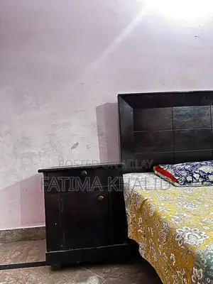 Two Single Beds with Matching Side Tables