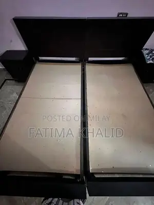 Two Single Beds with Matching Side Tables