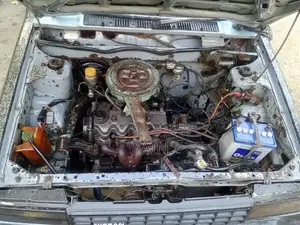 Photo - Classic Nissan Sunny B11 Sedan - Well-Maintained Vintage Car