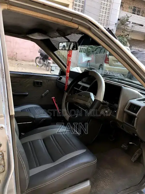 Classic Nissan Sunny B11 Sedan - Well-Maintained Vintage Car