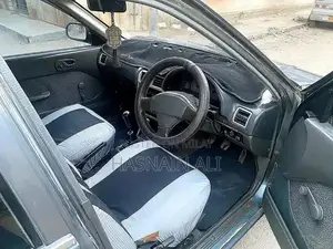 Suzuki Cultus VXRI EFI Hatchback Compact Car