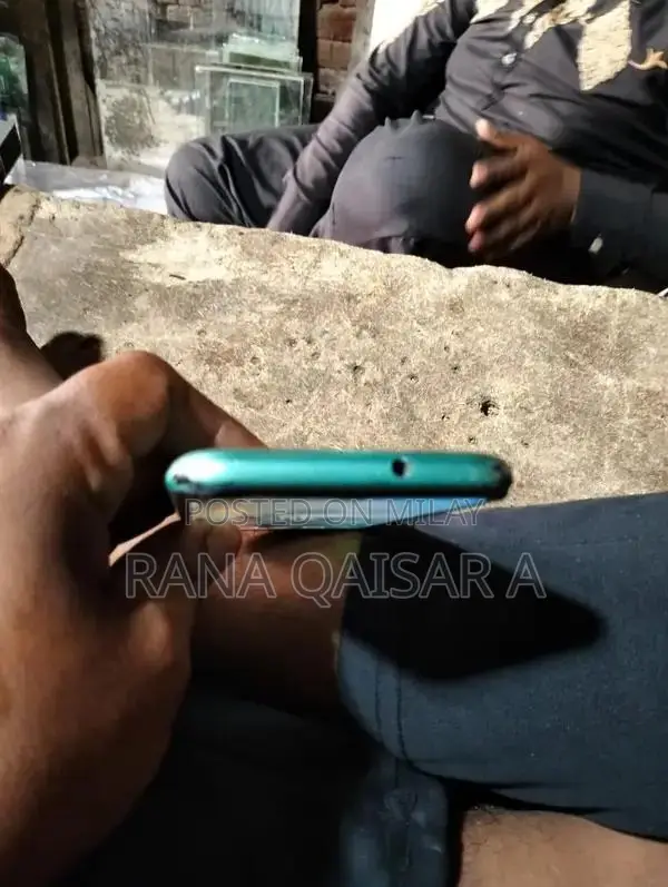 Compact Smartphone with Dual RAM and Storage Options