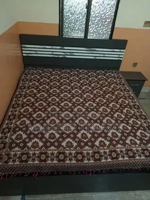 Photo - King Size Bedroom Set with Mattress, Side Table, and Cupboard