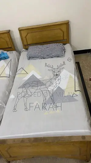 2 Single Wooden Beds