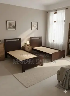 2 single wooden beds