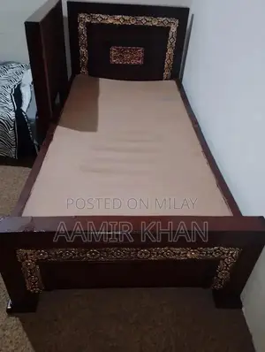Photo - 2 Wooden  Single beds  Condition 9/10