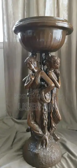 3 lady sculpture