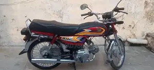 Photo - Honda 70 Motorcycle - Classic Small Displacement Bike