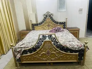 Iron and wood bed