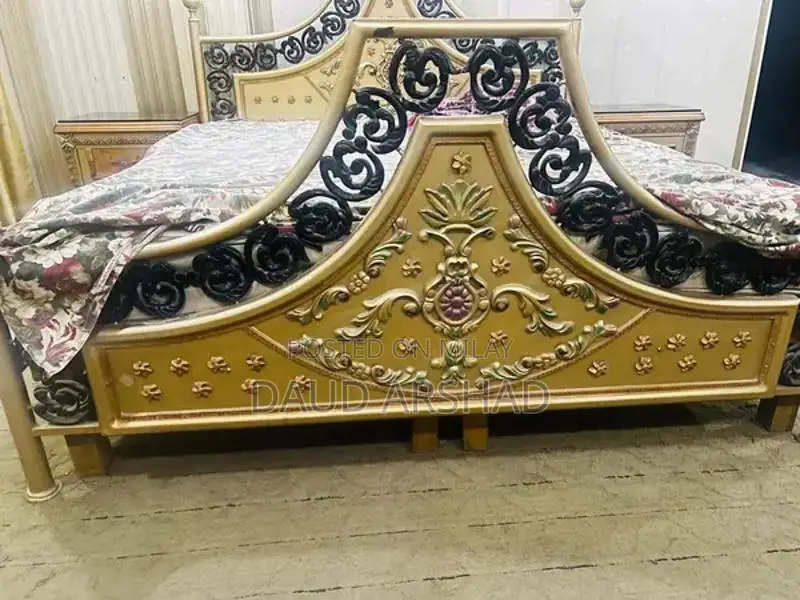Iron and wood bed