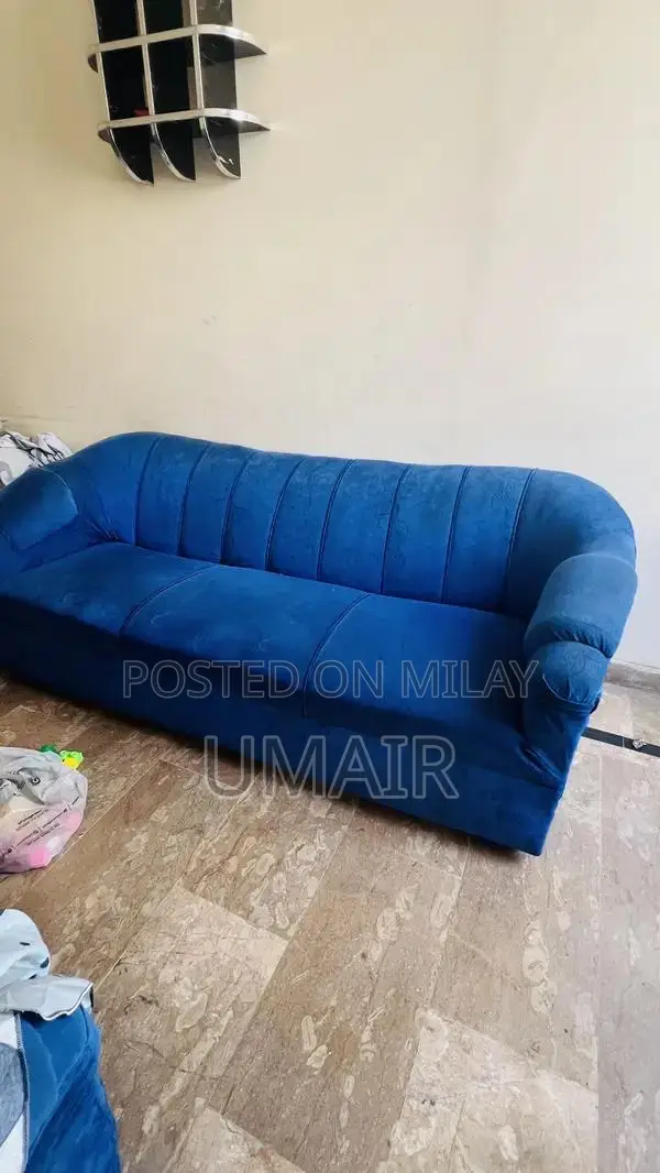 Blue velvet sofa
