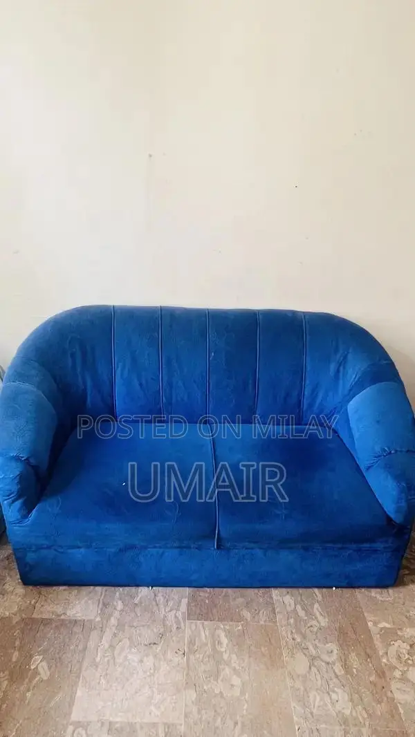 Blue velvet sofa