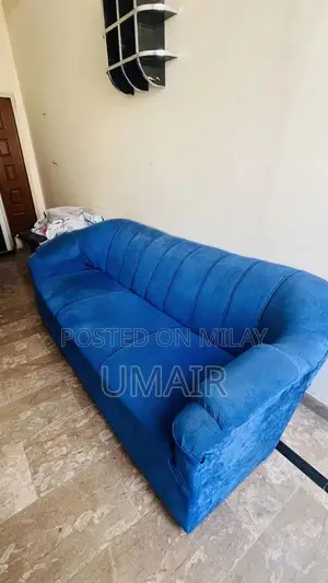 Blue velvet sofa