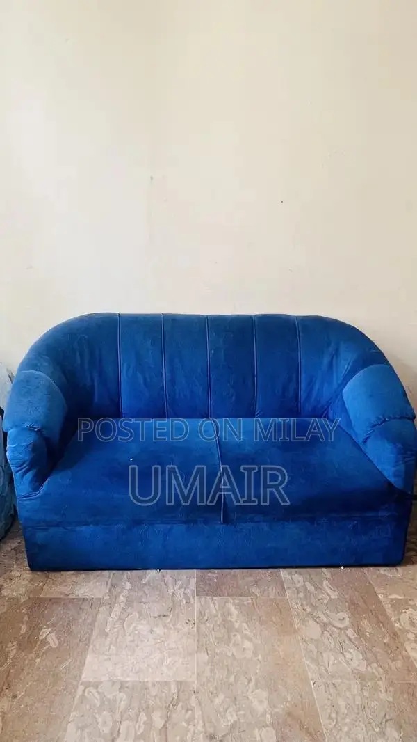 Blue velvet sofa