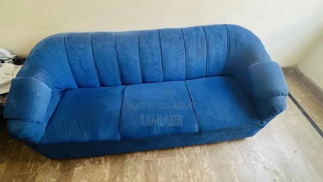 Blue velvet sofa