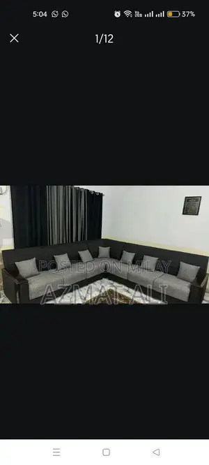 Photo - L shape sofa, 4 piece chair set, three piece table set and standing m