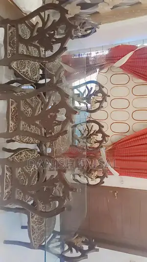 Photo - Dining table with chairs