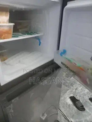 Photo - Small brand new fridge