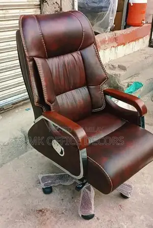 Photo - Ergonomic Brown Reclining Office Chair with Footrest