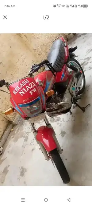 Photo - Honda Deluxe 125 Motorcycle - Compact Urban Commuter