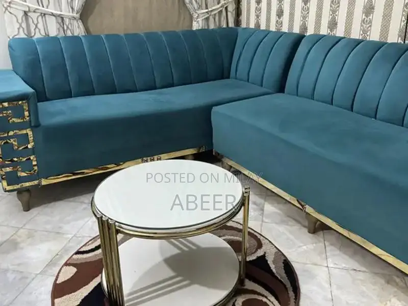 Luxury L-Shaped Sofa Set with Metallic Carving + Table & Puffies