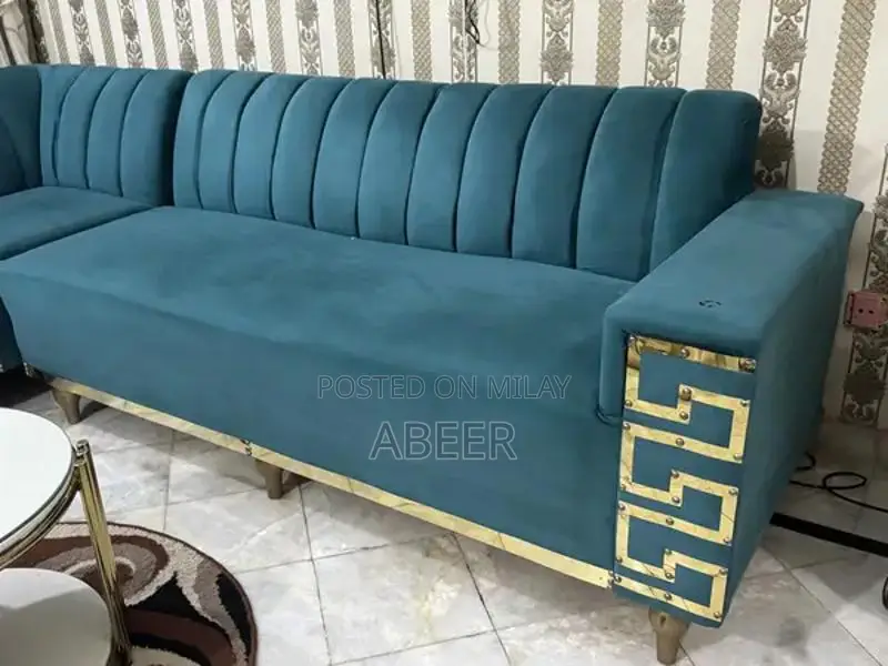 Luxury L-Shaped Sofa Set with Metallic Carving + Table & Puffies