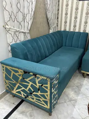 Luxury L-Shaped Sofa Set with Metallic Carving + Table & Puffies