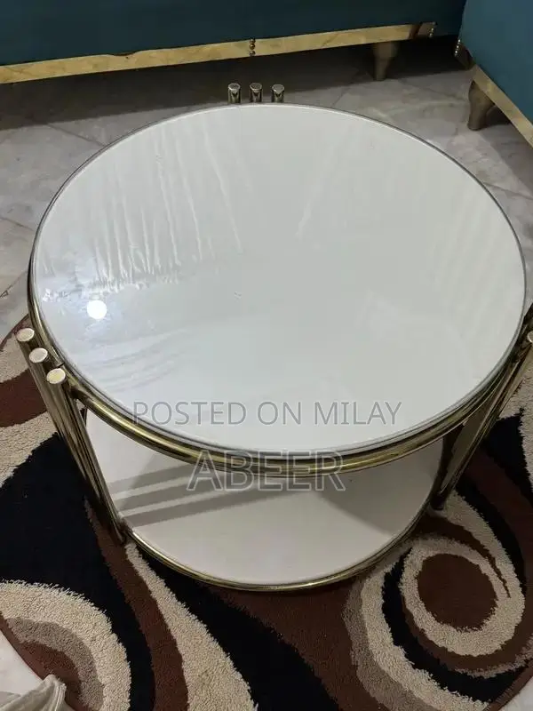 Luxury L-Shaped Sofa Set with Metallic Carving + Table & Puffies