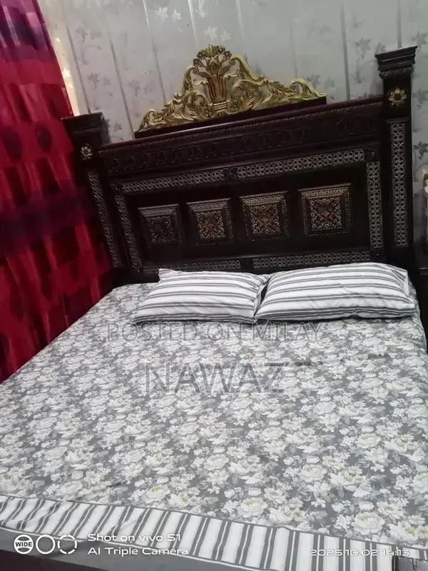 A pure wooden king bed on sale