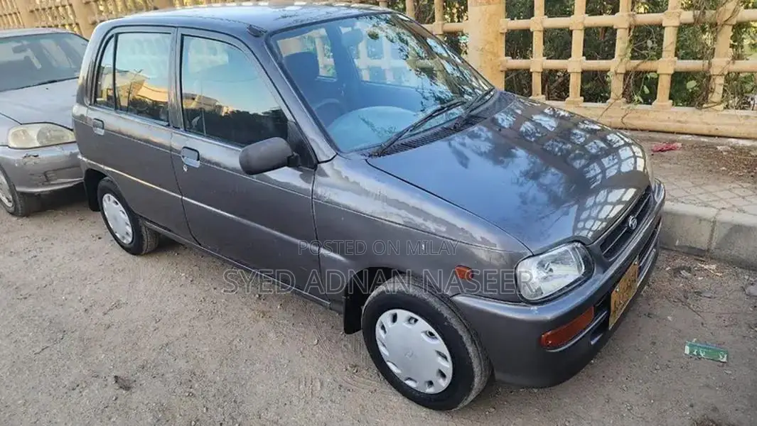 Daihatsu Coure 2005 Metallic Silver Compact Hatchback
