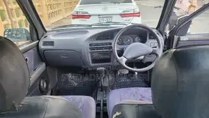 Daihatsu Coure 2005 Metallic Silver Compact Hatchback