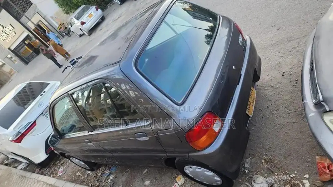 Daihatsu Coure 2005 Metallic Silver Compact Hatchback