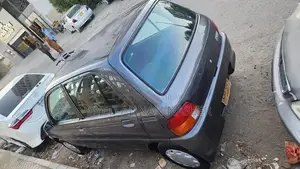 Daihatsu Coure 2005 Metallic Silver Compact Hatchback