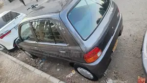 Daihatsu Coure 2005 Metallic Silver Compact Hatchback